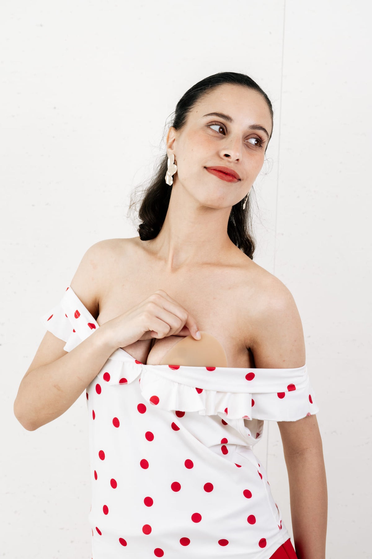 PUFF Lift Nipple Cover shown with an off-shoulder top